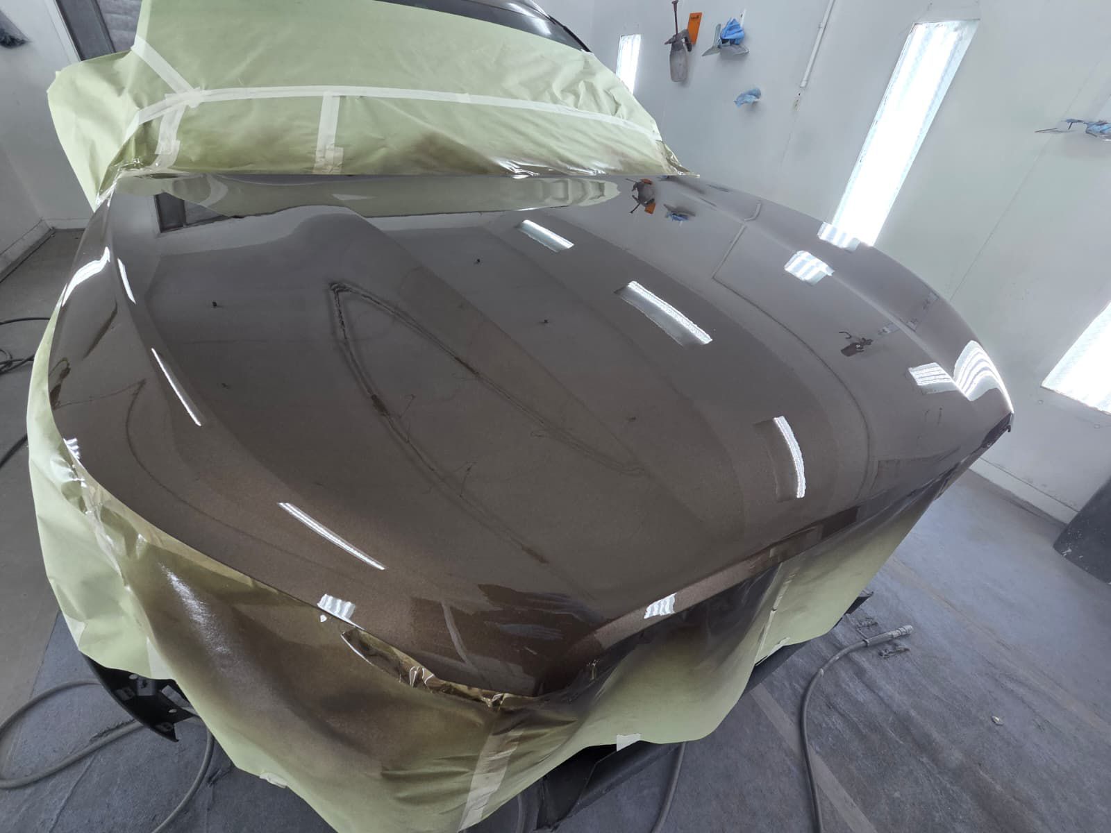 Metallic hood close-up with glossy finish